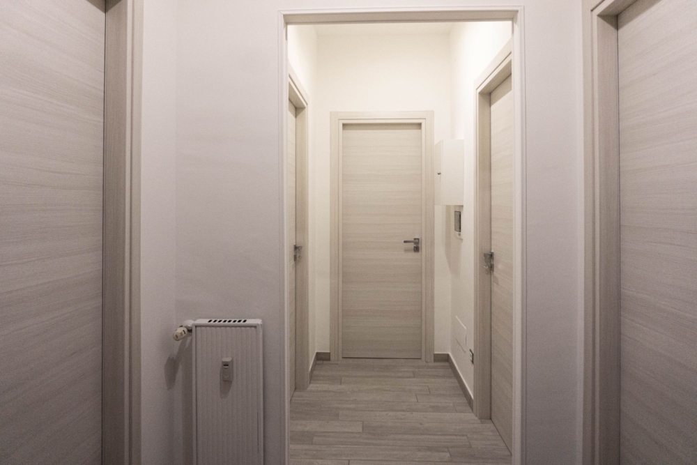 XX-Settembre-15-04_Corridoio NewStyleHome: Immobile Via XX Settembre 15 corridoio