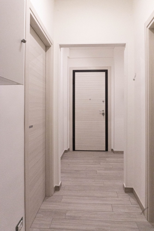 XX-Settembre-15-05_Corridoio NewStyleHome: Immobile Via XX Settembre 15 corridoio